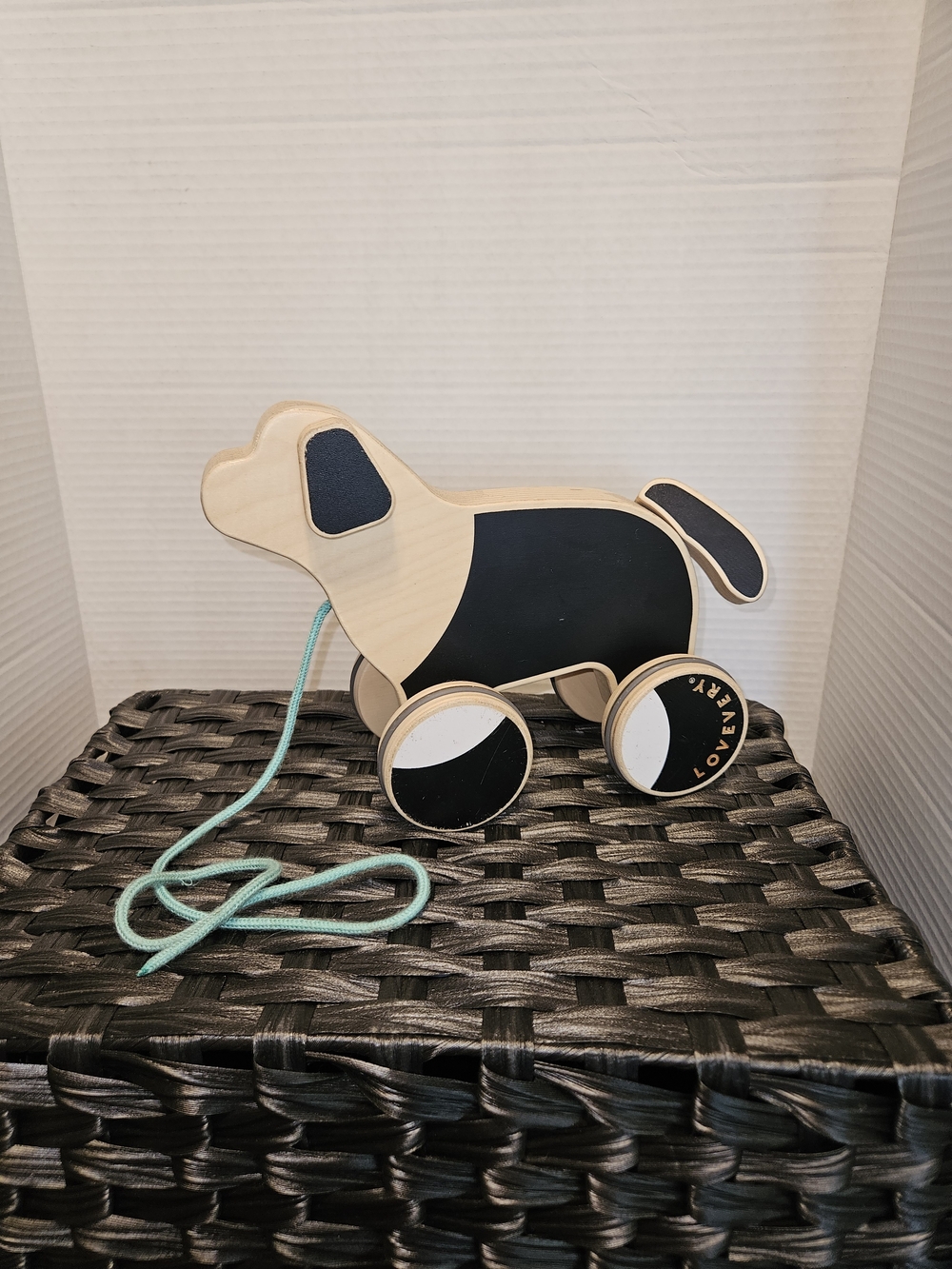 Natural Wood Pull-Along Puppy Toy with Black Panels and Mint Cord